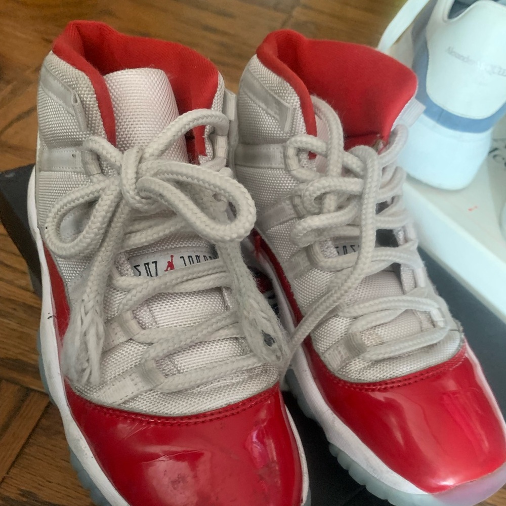 Red and white jordans